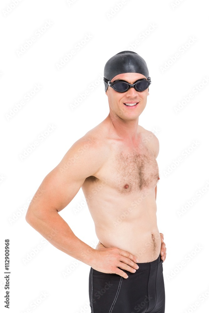 Swimmer standing with hand on hip