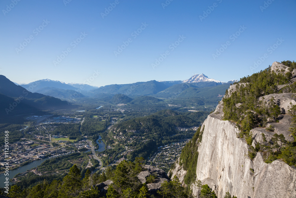View of the Second Mountain Peak from the First Peak of Chief Mountain. Part of Squamish residential houses seen below.