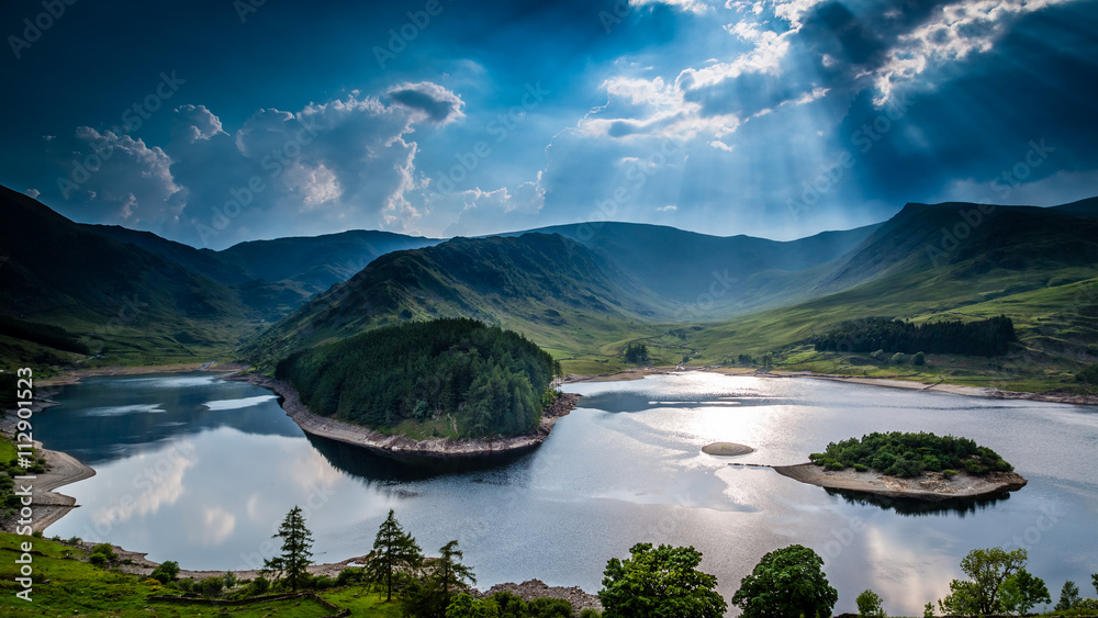 Fototapeta premium Sun rays on Haweswater, The Lake District, Cumbria, England