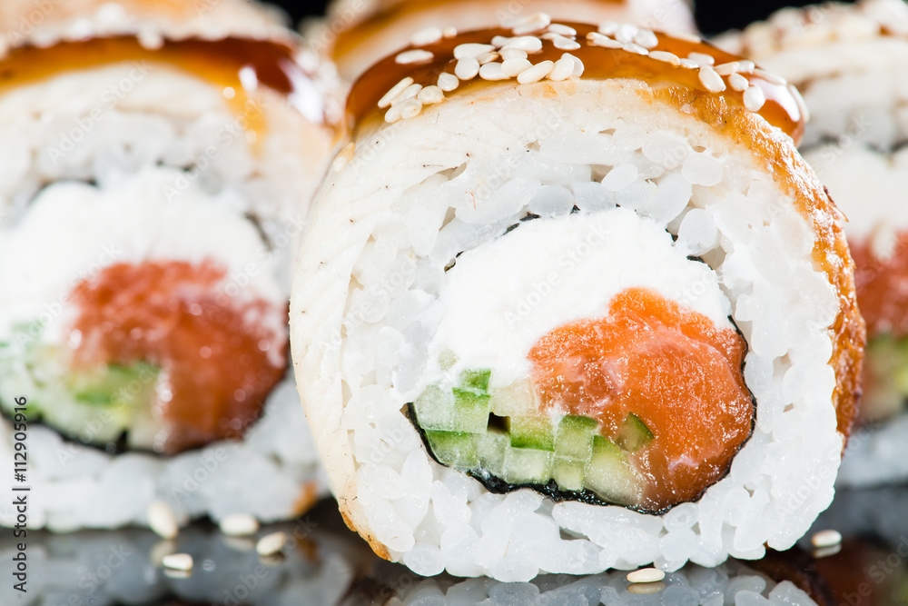 close-up of sushi with salmon and eel close-up of sushi with salmon and eel