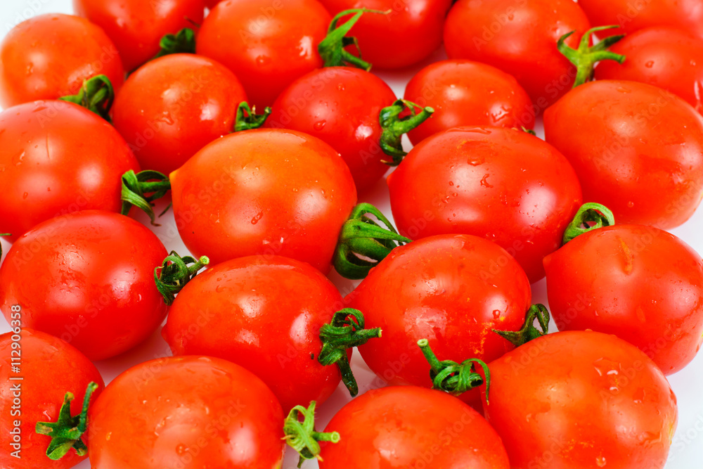 Red Tomatoes Isolated on a White Background Red Tomatoes Isolated on a White Background
