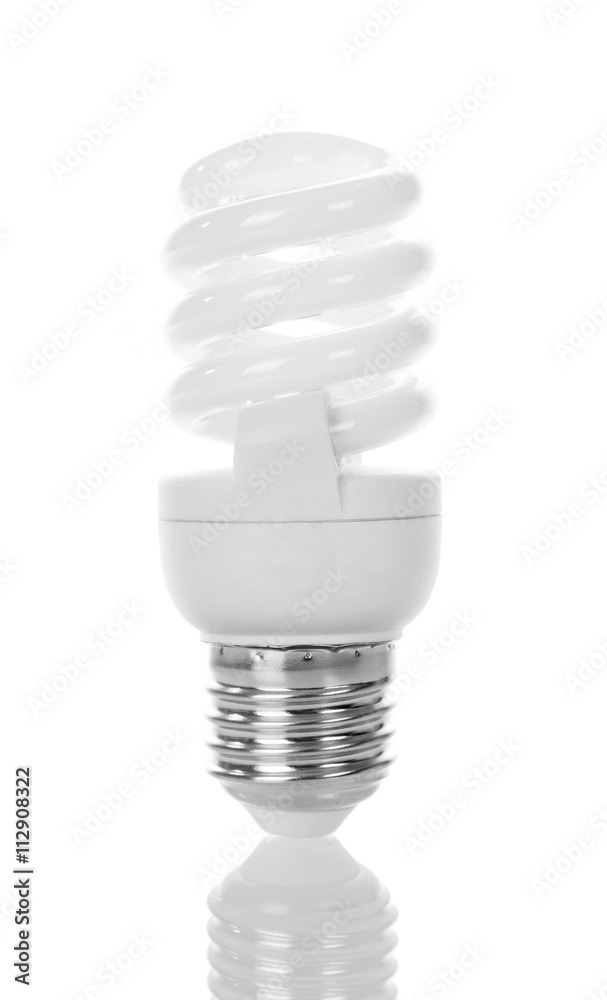 Compact fluorescent light bulb close up isolated on white. Compact fluorescent light bulb close up isolated on white.