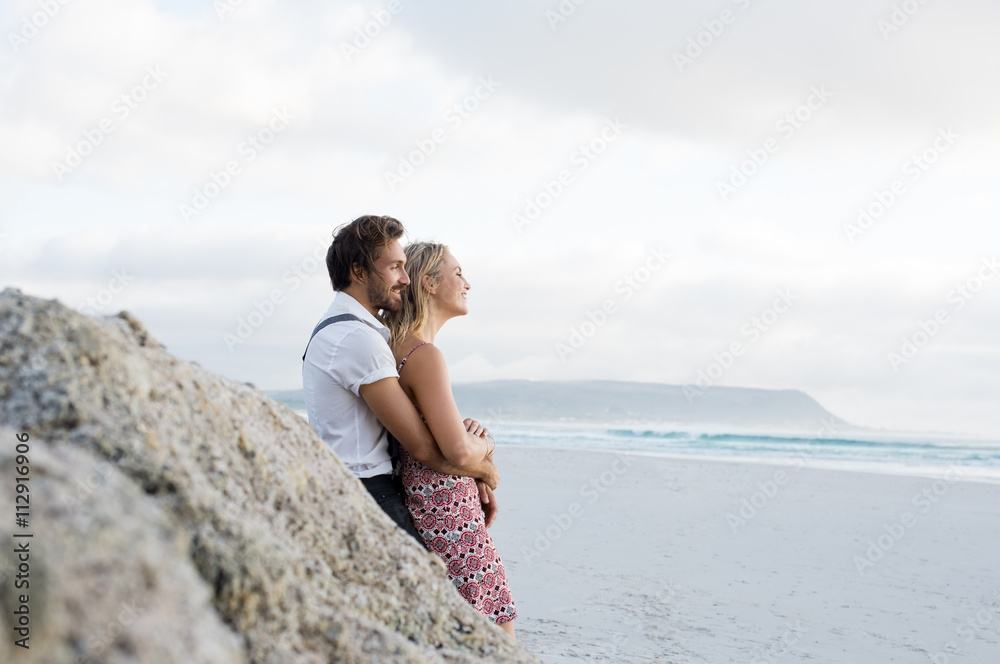 Couple looking at sea