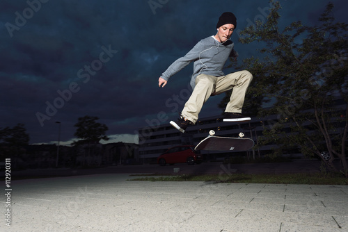 Skateboard Pro Flip Trick at Night