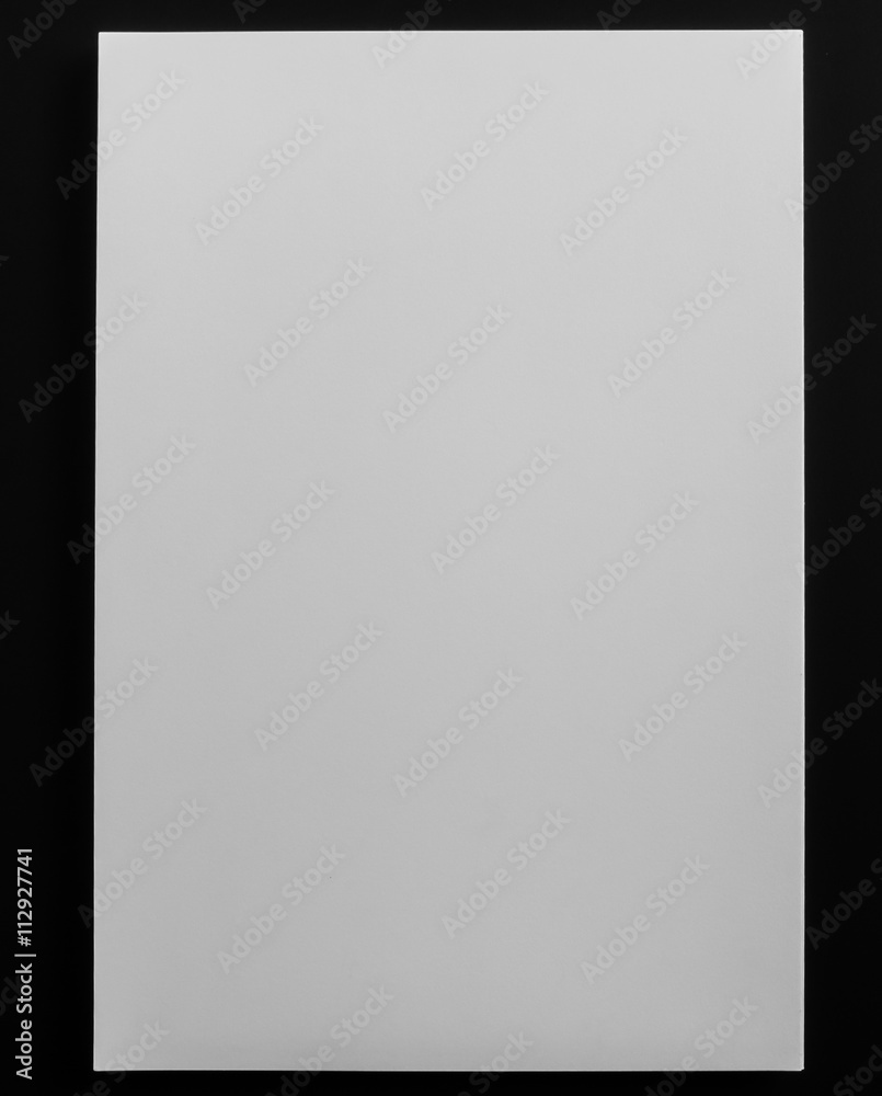 White template paper on black background .