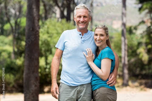 Couple smiling and holding each other