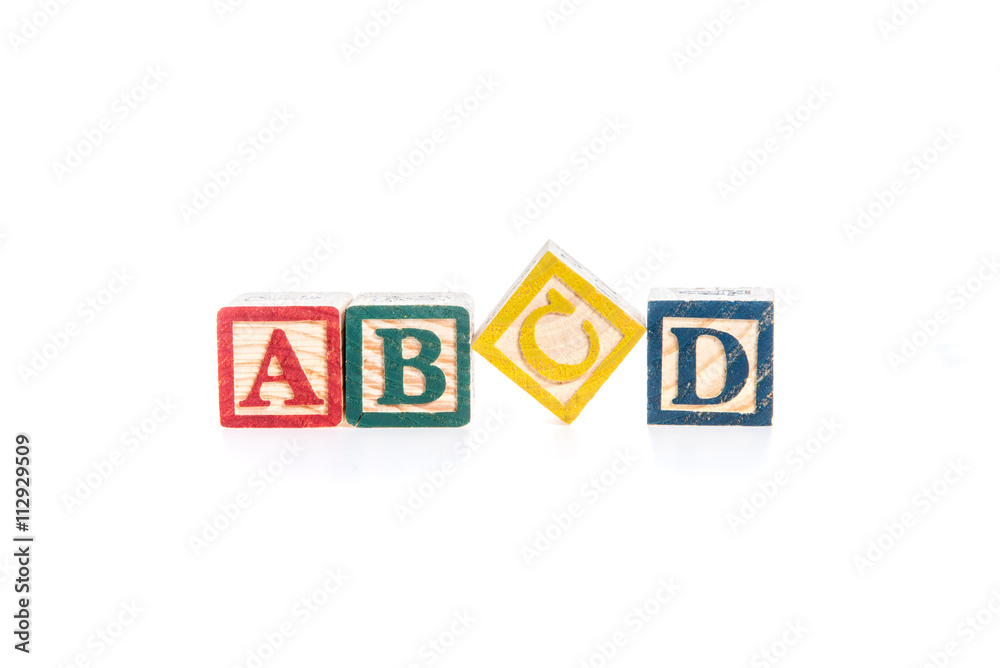 photo of a alphabet blocks spelling ABCD isolate on white backgr photo of a alphabet blocks spelling ABCD isolate on white backgr