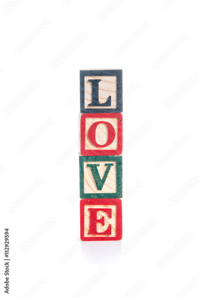 photo of a alphabet blocks spelling LOVE isolate on white backgr photo of a alphabet blocks spelling LOVE isolate on white backgr