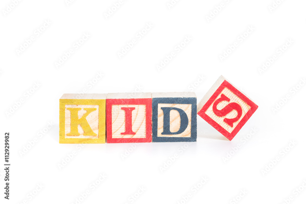 KIDS with colorful alphabet blocks on white background KIDS with colorful alphabet blocks on white background