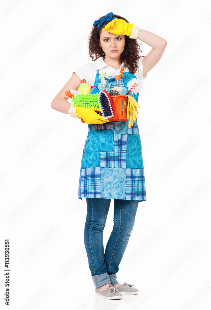 Tired young housewife with yellow gloves, isolated on white background Tired young housewife with yellow gloves, isolated on white background