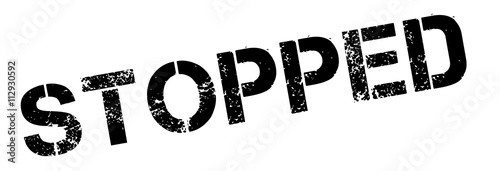 Stopped black rubber stamp on white