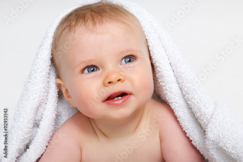 baby under a towel