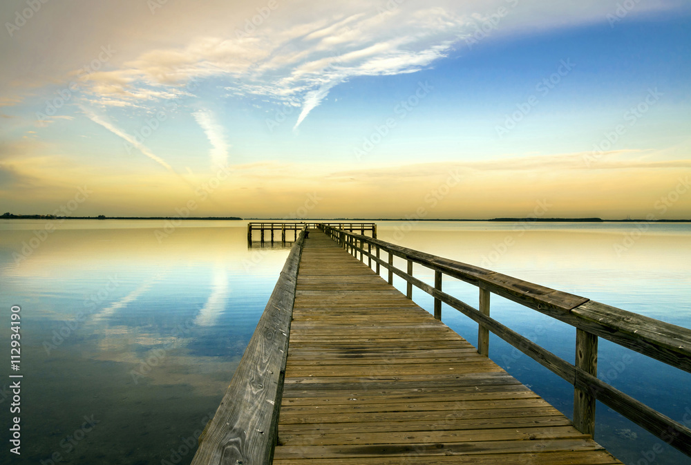 USA, Florida, Terre Ceia Bay. Sunrise on the pier on Terre Ceia Bay on Florida's Gulf Coast USA, Florida, Terre Ceia Bay. Sunrise on the pier on Terre Ceia Bay on Florida's Gulf Coast