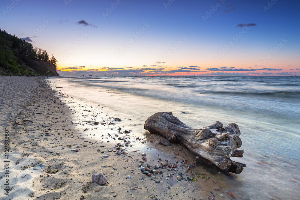 Obraz premium Baltic sea in Gdynia Orlowo at sunrise, Poland