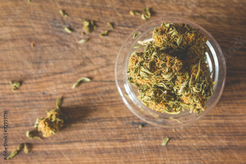 Marijuana buds in the glass plate photo