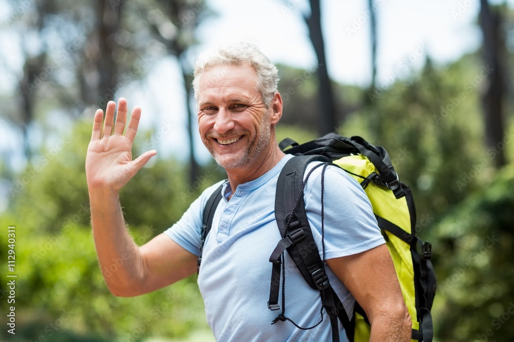 Fototapeta premium Portrait of a man smiling and greeting