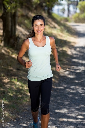 Woman smiling and running 