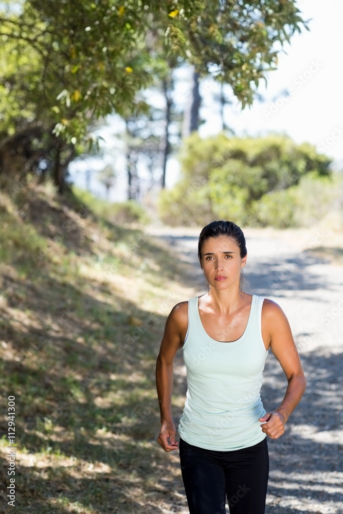 Front view of woman jogging Front view of woman jogging