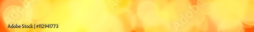 warm bokeh banner in shades of yellow and orange 