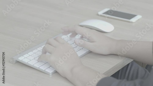 Woman hands typing on a computer keyboard (Slog)