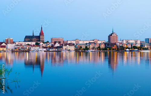 Night Panorama view to Rostock. River Warnow and City port.