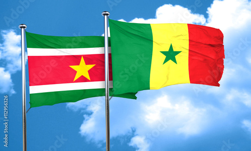 Suriname flag with Senegal flag, 3D rendering