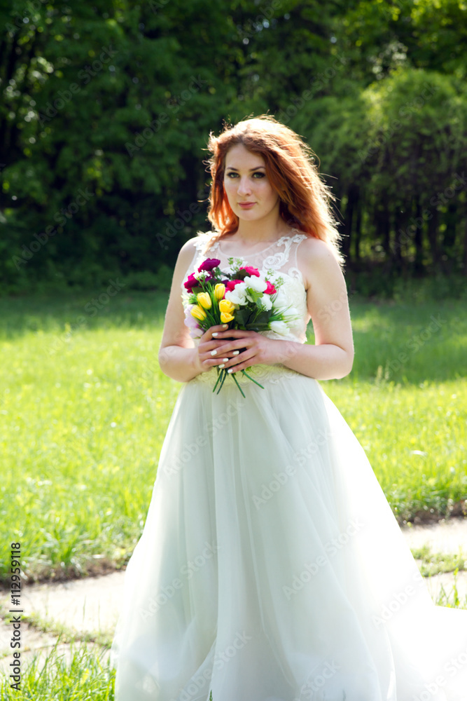 Portrait of a beautiful bride with a bouquet Portrait of a beautiful bride with a bouquet