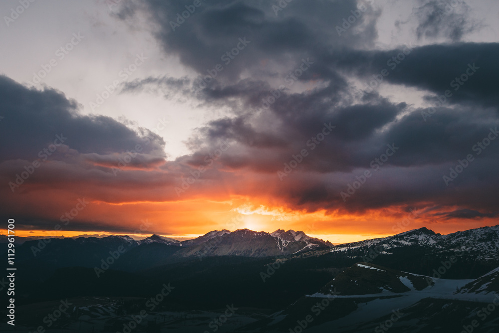 Mountain on fire - Red burning sunset behind Dolomite mountains. Mountain on fire - Red burning sunset behind Dolomite mountains.
