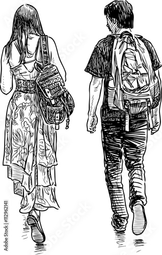 students couple on a walk