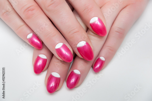 pink white manicure on long oval  sharp nails