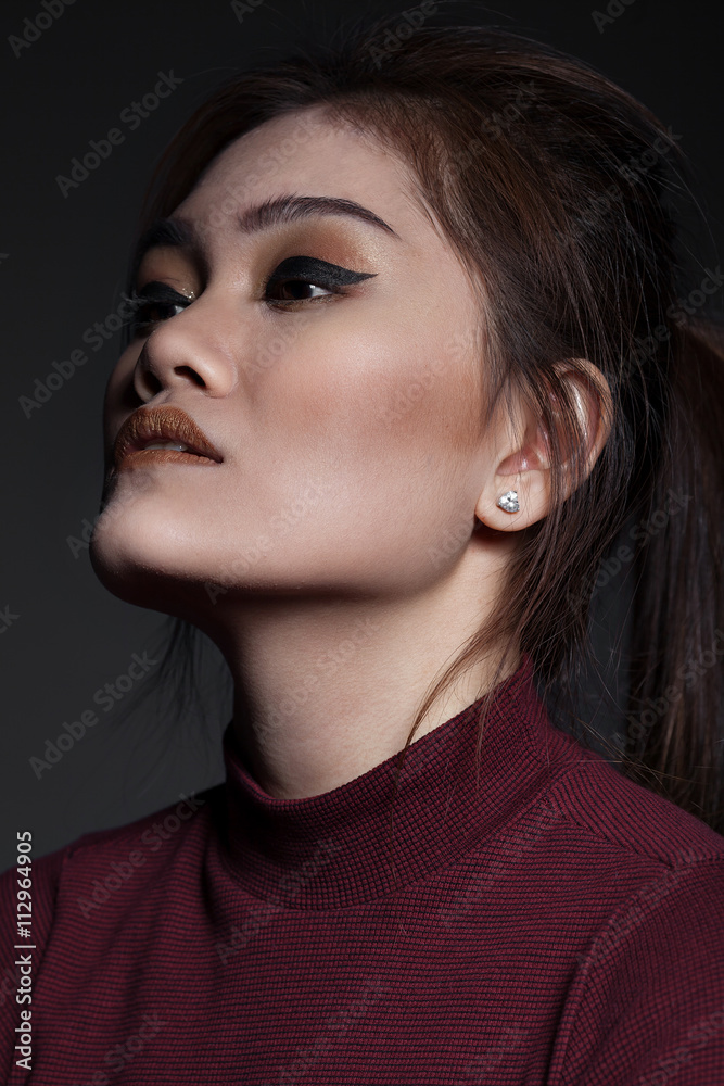 Portrait of beautiful sexy brunette woman. Asian girl. Portrait of beautiful sexy brunette woman. Asian girl.