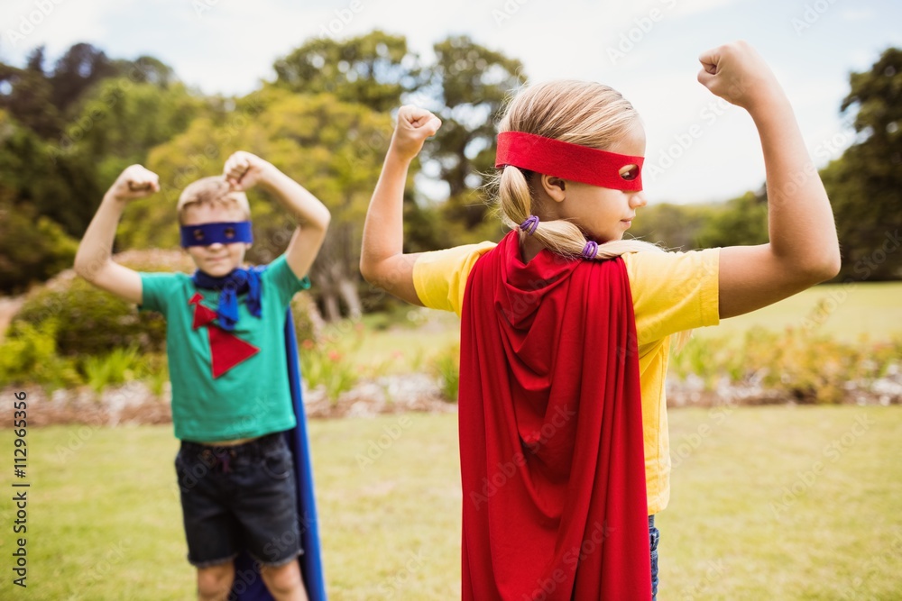 Obraz premium Children wearing superhero costume posing