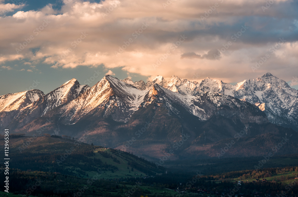 Cloudy Tatra mountains in the morning, covered with snow