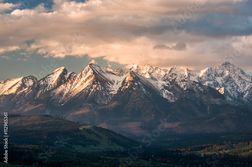 Cloudy Tatra mountains in the morning  covered with snow
