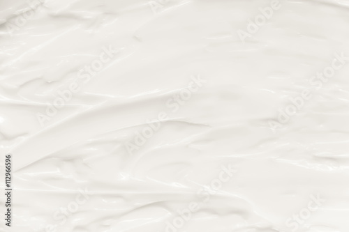 Cosmetics. Cream white background texture.