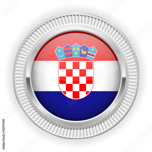 Runder Button mit kratische Flagge und silber Rand