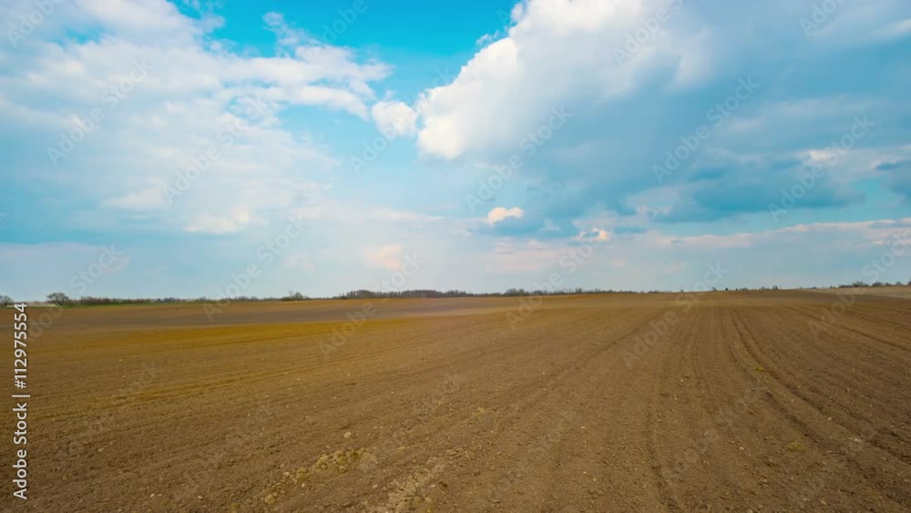 spring plowed field, panoramic time-lapse spring plowed field, panoramic time-lapse