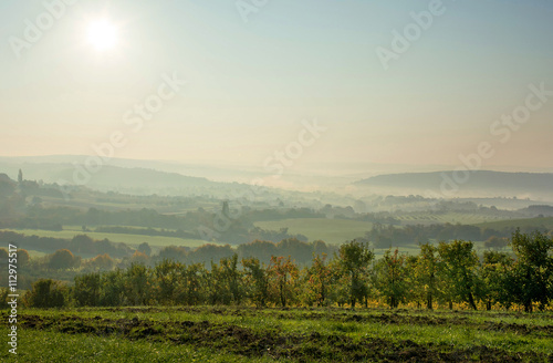 Saarland – Bliesgau Landschaft bei Bliesransbach mit Streuobstwiese morgens photo