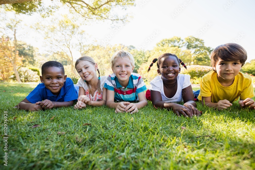 Kids posing together during a sunny day at camera Kids posing together during a sunny day at camera
