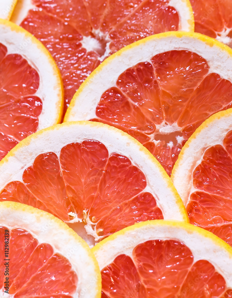 Close up of sliced grapefruit as a background.
