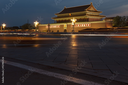 Moving traffic at the Gate of heavenly peace in Tiananmen Square, Beijing, China
