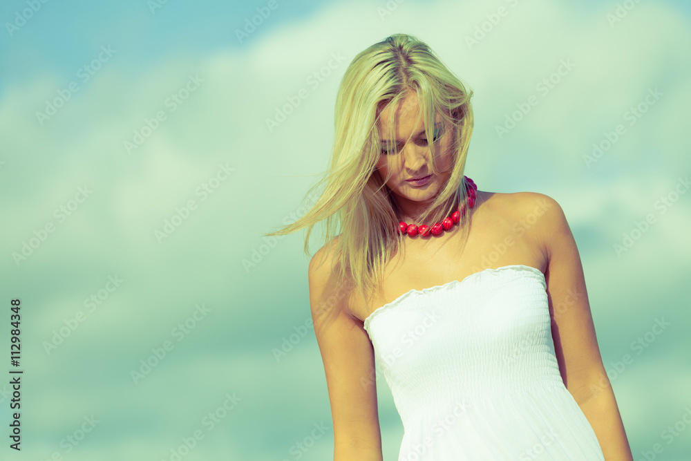 Beauty blonde woman portrait on sky background. Beauty blonde woman portrait on sky background.