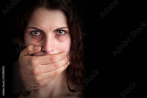 Woman Silenced by Aggressive Husband