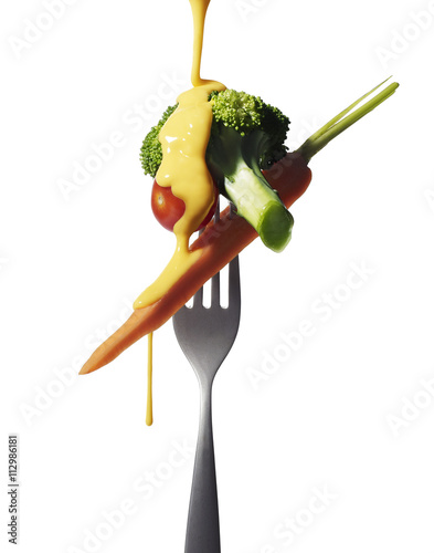 Fork with vegetables and melted cheese