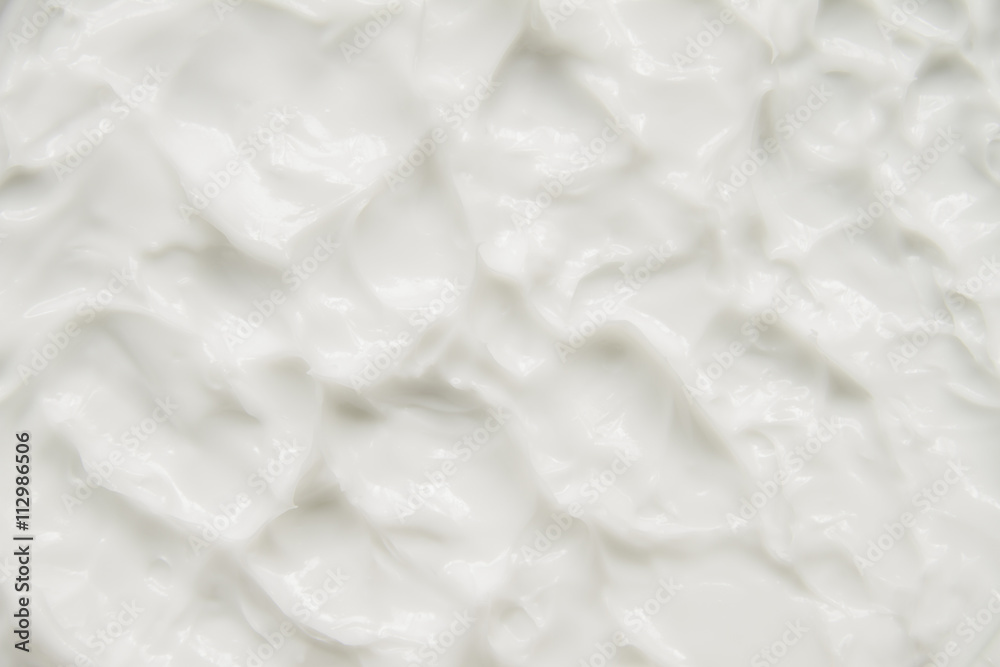 Fototapeta premium Cosmetics. Cream white background texture.