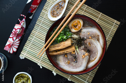 japanese tonkotsu ramen, pork bone broth noodles top view photo