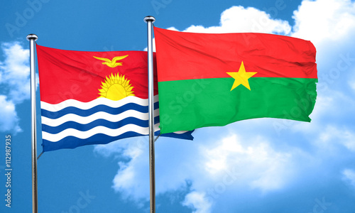 Kiribati flag with Burkina Faso flag, 3D rendering