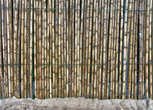 beautiful Bamboo fence on the sand
