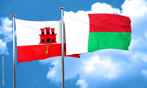 gibraltar flag with Madagascar flag, 3D rendering