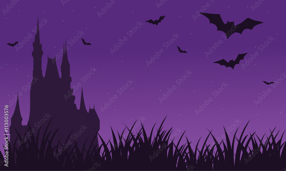 Silhouette of castle and bat twilight Halloween